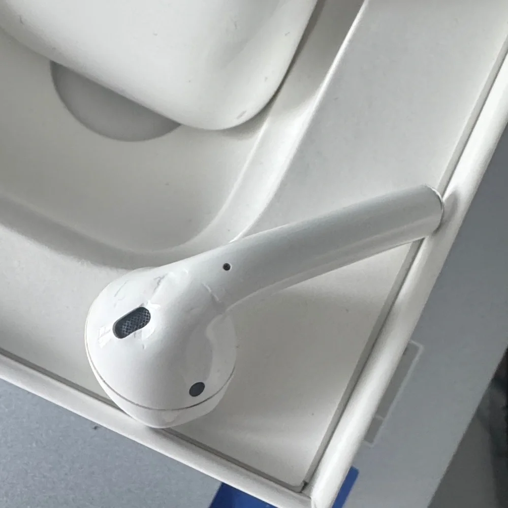 Apple AirPods with Charging Case - White